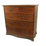 An Edwardian mahogany and satinwood banded Chest, with three long and two short drawers on bracket