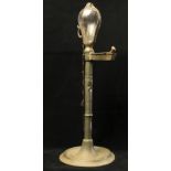 An 18th Century pewter Desk Light, with original glass bulbous oil container and finger handle on