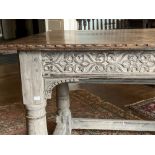 A late 18th / early 19th Century oak Table,ÿÿwith carved edges and reliefs, on turned legs, united