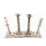 A pair of George II style silver plated Candlesticks, 10" (25cms); and a pair of silver plated