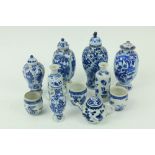 A selection of six blue and white miniature Vases, (four with covers); a miniature blue and white