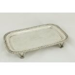 A George III rectangular crested Tray, by John Moore, London 1815, with gadroon edge on beaded