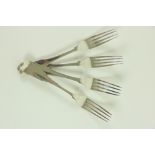 A good set of 16 heavy Irish George III silver fiddle pattern and crested Dinner Forks, by Samuel