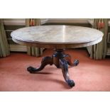 A Victorian circular walnut Breakfast Table,ÿon a turned stem on a tripod with scroll legs, 52" (