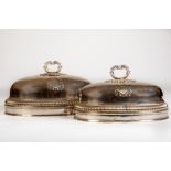 A very fine and large pair of crested silver plated Venison or Turkey Domes, early 19th Century,