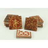 A rare collection of 11 matching Medieval Floor Tiles, each approx. 16cms (6") square, decorated