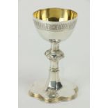 A fine Victorian silver Chalice, in the Gothic Revival style with hexagonal flaring knopped stem, by