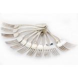 A very good set of 8 - George III silver crested fiddle and thread pattern Table Forks, London 1818;