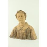 A 19th Century terracotta monochrome Bust of a Saint, head and shoulders, 18 1/4" (47cms). (1)