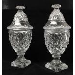 A quality pair of early 19th Century Irish cutglass pineapple shaped Jars and covers, on square