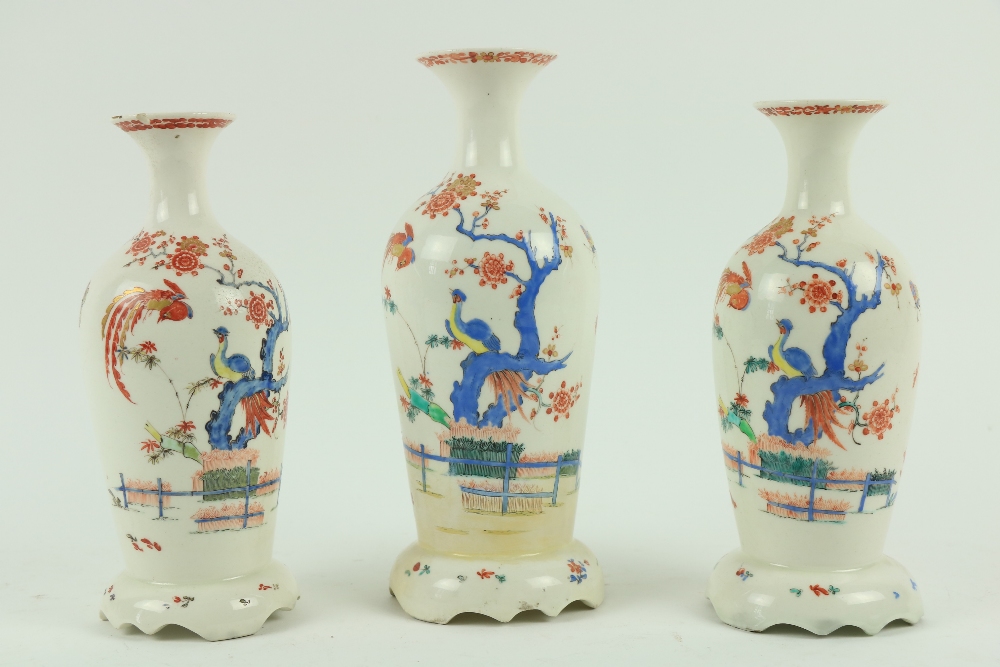 A fine garniture of 3 early Bow Kakiemon Vases, each of oviform with flared necks decorated in the