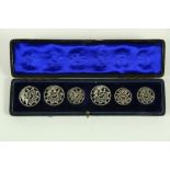 A good set of 6 - 19th Century English silver Buttons, each chased and pierced with flowers and
