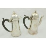 A George I style crested silver Coffee Pot, London 1929, of upward tapering form with dome cover and