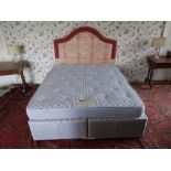A modern 5' Orthopaedic Divan Bed, with double base and an upholstered headboard, as a bed, w.a.