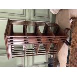 An early Edwardian walnut Revolving Open Bookcase, with slatted dividers on quadruple pod, approx.