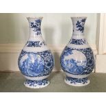 A fine pair of blue and white early 18th Century Delft Dishes, each decorated with hunting scenes