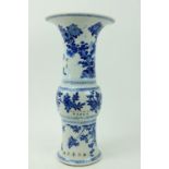 A large important Kangxi period blue and white Gu Vase, 18th Century, decorated with birds and