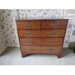A 19th Century inlaid mahogany Chest, with three long two short drawers on bracket feet, 40" x