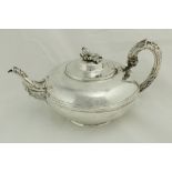 A William IV Irish silver Teapot, by W. Nowlan, Dublin 1832, with ornate rustic handle and spout