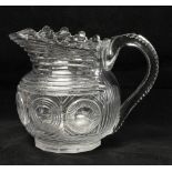 A quality 19th Century "Waterford" cutglass Water Jug, of small proportions with serrated rim, the