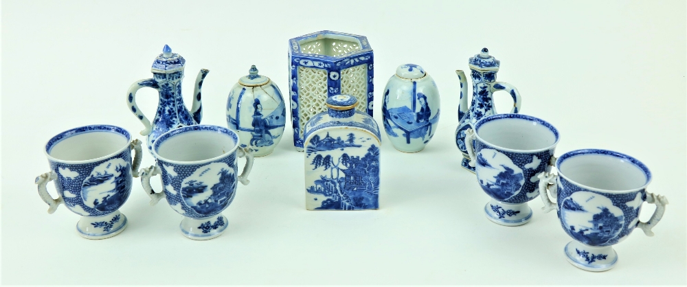 A set of four two handled blue and white Chinese porcelain Cups, each on stemmed base, 10cms (4")