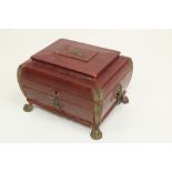 A very unusual Regency period leather bound ladies Sewing Casket, with brass mounts, the hinged