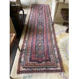 A very fine semi-antique Persian Runner, the central medallion with a row of twelve hexagons, on a