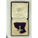 Member of the British Empire Medal:ÿÿÿAn M.B.E. awarded to Mrs. Bertha Gaisford-St. Lawrence (nee