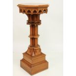 A good Victorian Gothic Revival oak Pedestal, with octagonal top above a frieze with Gothic  tracery