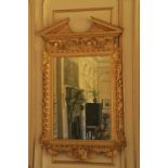 A highly important pair of Irish George II carved giltwood and gesso Architectural Pier Mirrors,