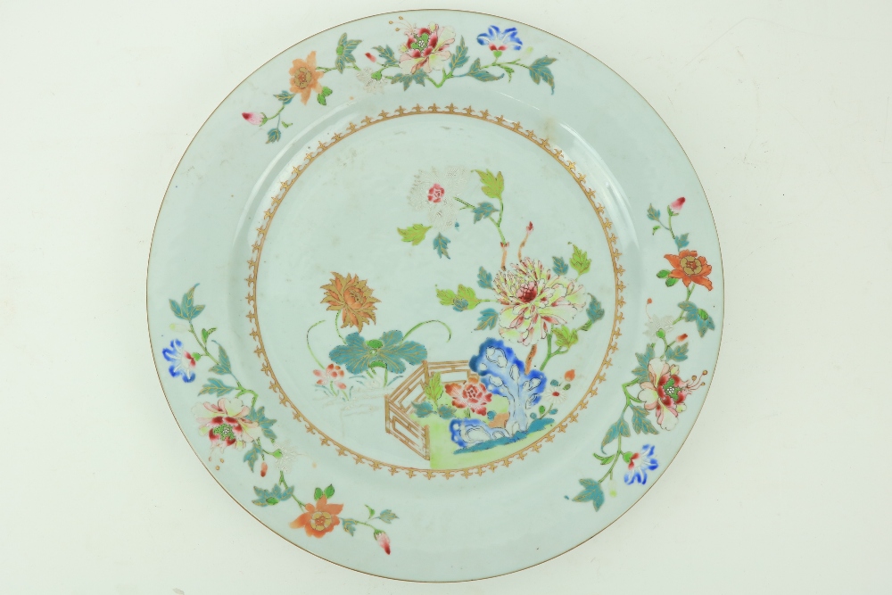 An 18th Century Chinese Famille Rose Platter, decorated with colourful flowers, with fleur de lys