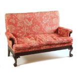 An Irish late 19th Century mahogany framed two seater Couch, probably by Butler of Dublin, the