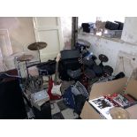 A large quantity of assorted Rock Band Equipment, comprising drums, electric guitars, band