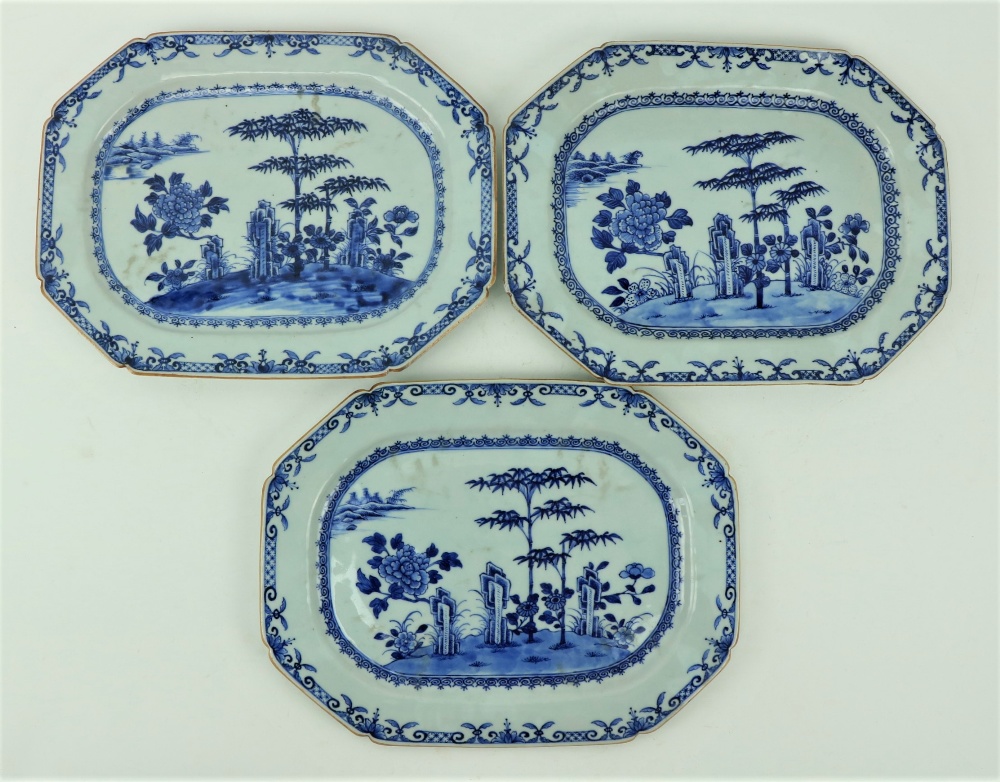 A good set of three Nankin Chinese porcelainÿblue and white Platters, decorated with trees and
