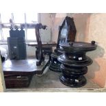 Four various ebonised Trophy Stands, on ebonised dome stand, a zinc Wall Fountain, a small