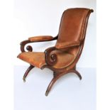 A very fine William IV - X framed mahogany Library Armchair, with recurving seat and back, covered