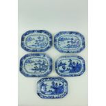 A set of three 18th Century Nankin blue and white porcelain Platters, decorated with boat houses and