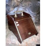 An Edwardian slope fronted brass mounted walnut Coal Scuttle, together with a carved Fire Bellows (