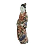 A fine quality and colourfully decorated 19th Century Japanese porcelain Figure, modelled as a '