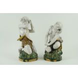 A rare pair of late 19th Century Mintons Majolica Figures, modelled as Adam & Eve wearing animal