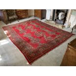 A large semi-antique Turkish Ushak, with geometric design centre and with conforming border, approx.