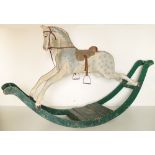 A large Victorian Rocking Horse, painted grey on a green arched base. (1)