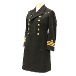 A Royal Navy Officer's Uniform, with overcoat, jacket, pair of trousers, mess jacket, a pair of