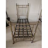 A pair of late 19th Century 3' brass Twin Beds, each with tubular rails and ball finials, 37" (
