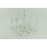 Five various cutglass Decanters & Stoppers, various sizes, a plain glass bottle Decanter and