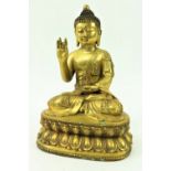 A fine quality large Chinese gilt bronze Figure, of a Buddha, seated on a double lotus base, the