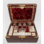 A Victorian brass mounted mahogany Vanity Case, with Bramah lock, the interior fitted with