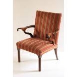 A fine and unusual George III period mahogany Gainsborough type Library Armchair, with scrolling