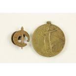 Medal & Badge:  'A Claidheamh Soluis' brass Lapel Badge; together with a W.W.1. Medal, awarded to