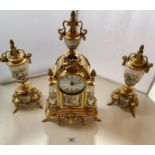 Reproduction 3 piece French style gilt and enamel clock set with clock and 2 side urns. Clock 18” (